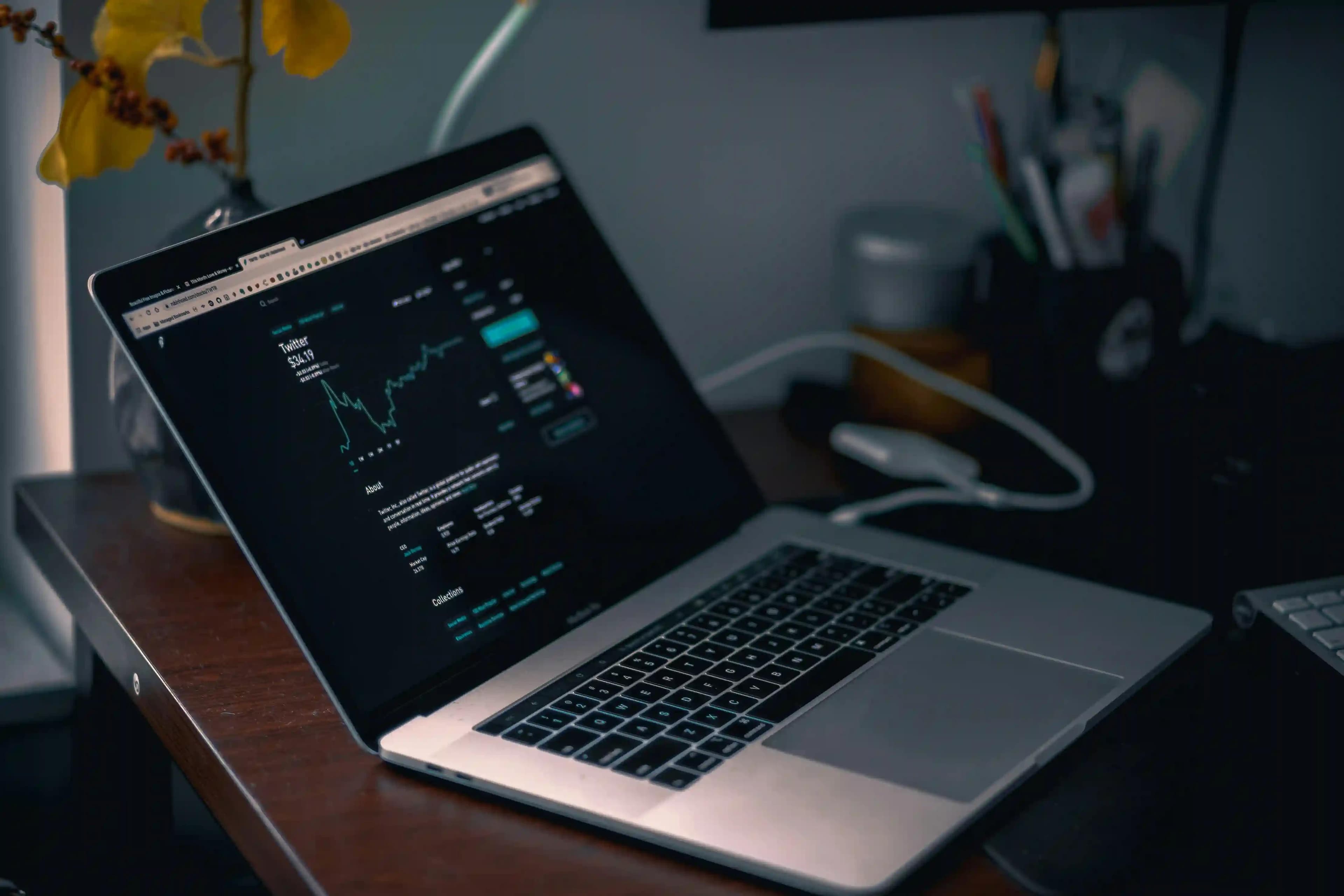 Prop firm trading dashboard displayed on laptop with real-time market performance data