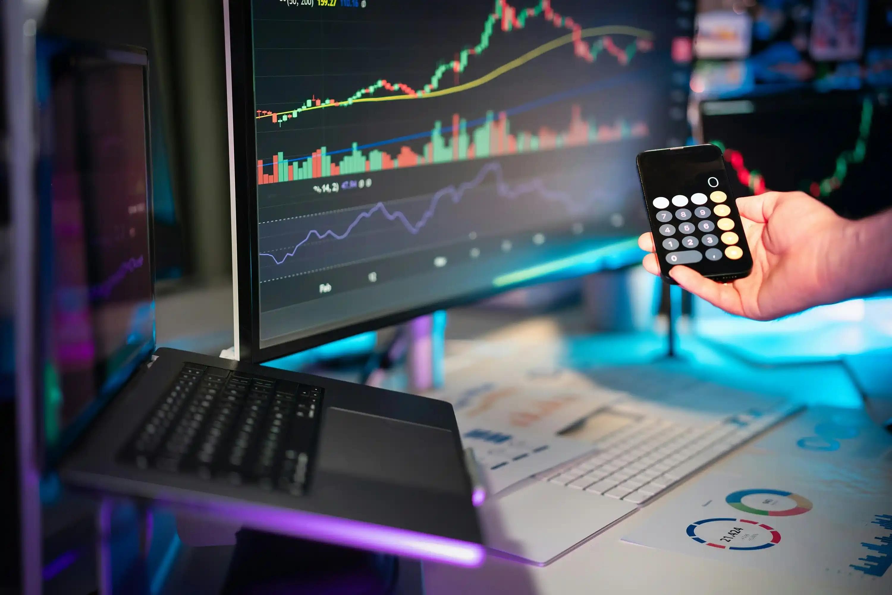 Prop firm trading setup with market charts and trading calculator analysis